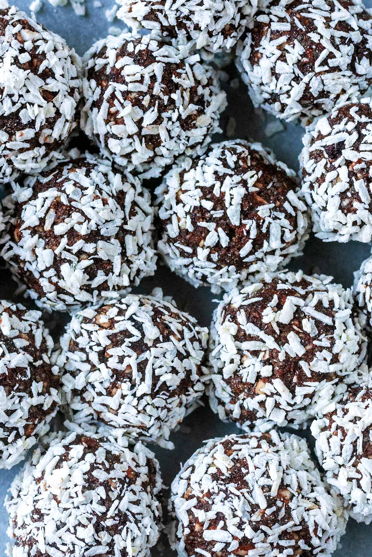 Chocolate energy balls coated in desiccated coconut.