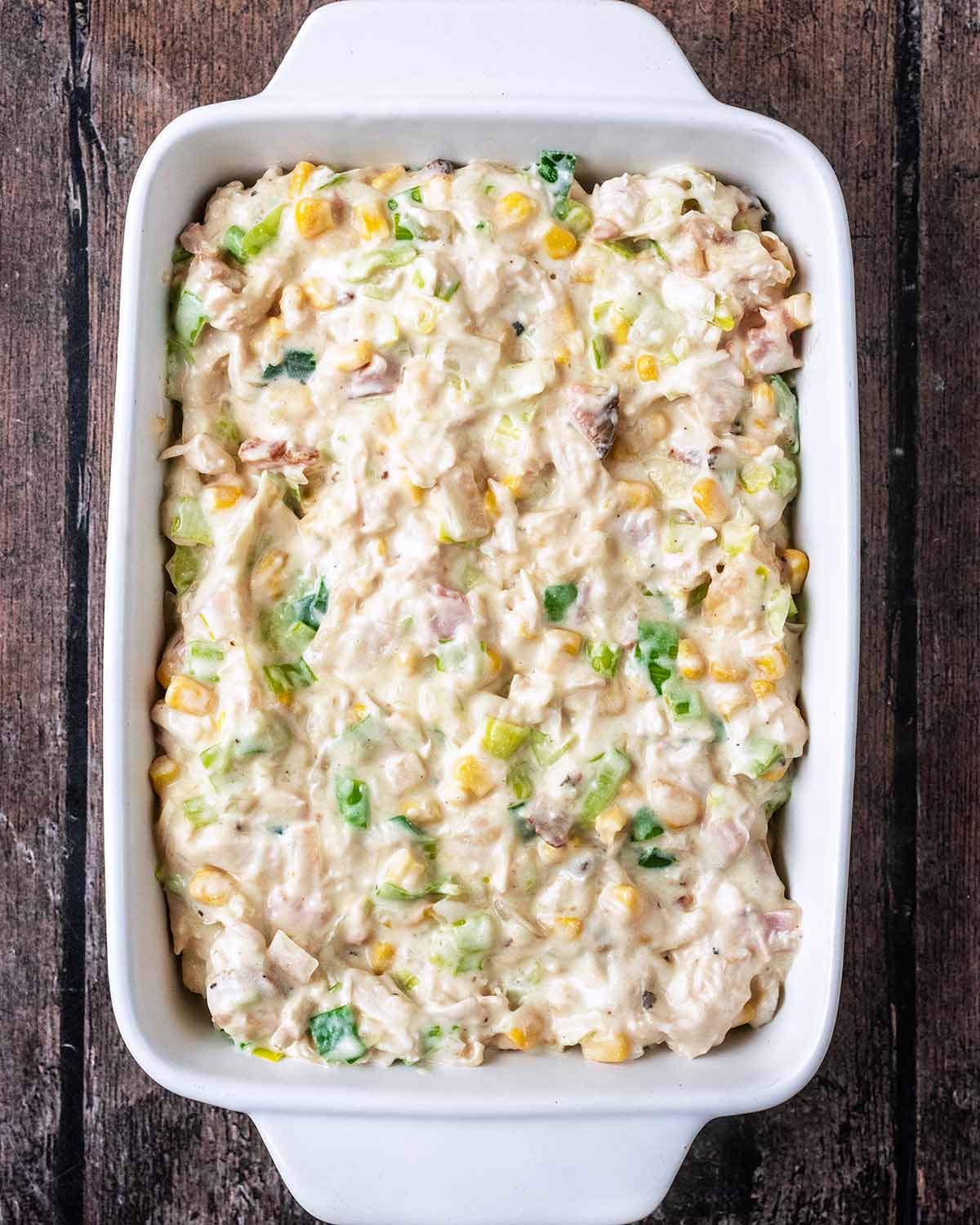 The creamy chicken and ham mixture in a baking dish.