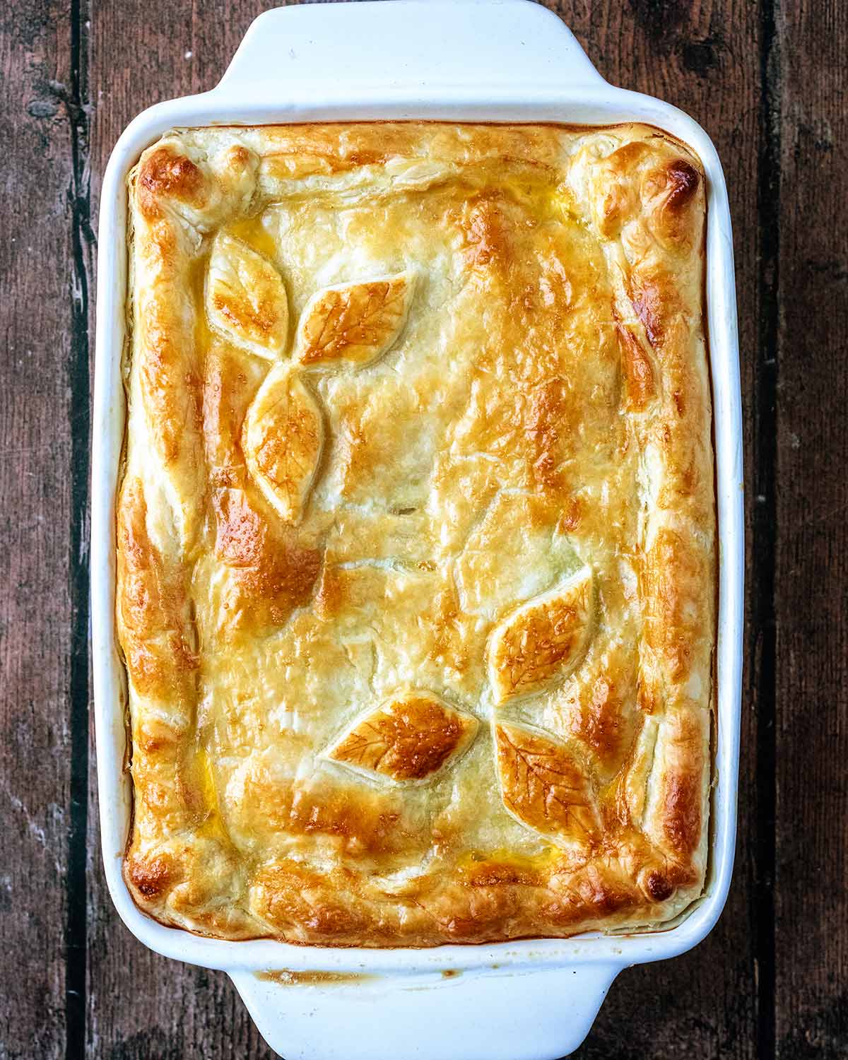 The cooked pie with a golden brown crust.