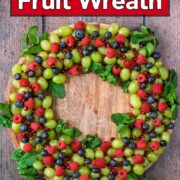 A Christmas Fruit Wreath with a text overlay title.