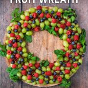 A Christmas Fruit Wreath with a text overlay title.