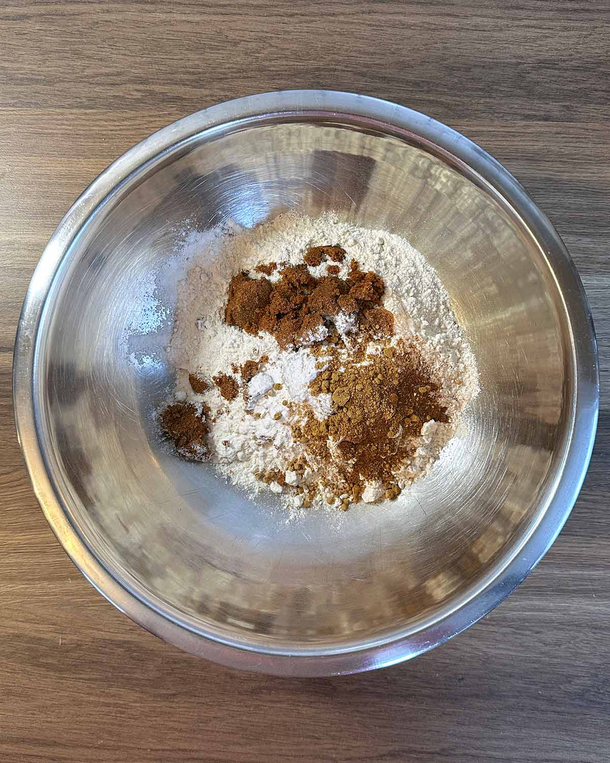 Flour, sugar, cinnamon and ginger in a large mixing bowl.