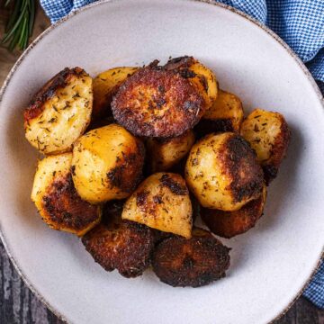 A bowl of slow cooker roast potatoes.