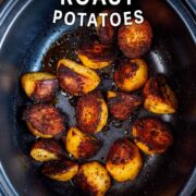 Slow cooker roast potatoes with a text overlay title.