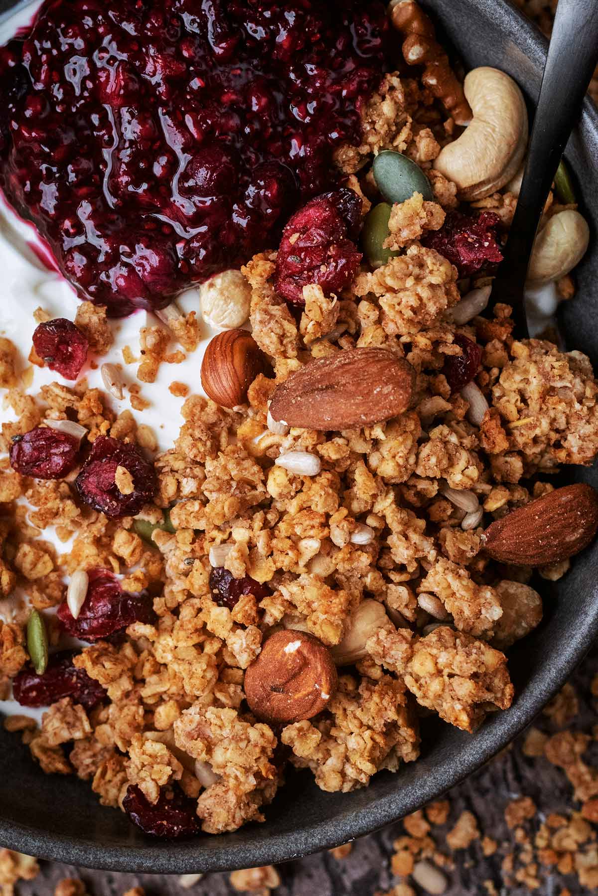 Granola and compote on top of some thick yogurt.