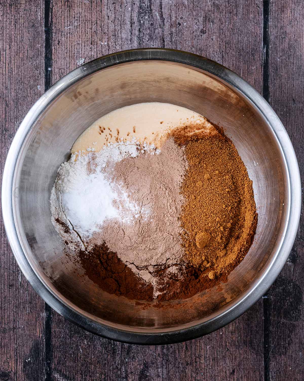 Blended cottage cheese, flour, sugar, protein powder and cocoa powder in a large mixing bowl.