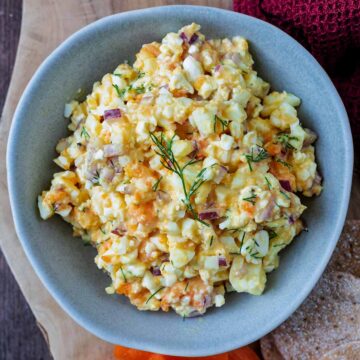 Cottage cheese egg salad in a round grey bowl.