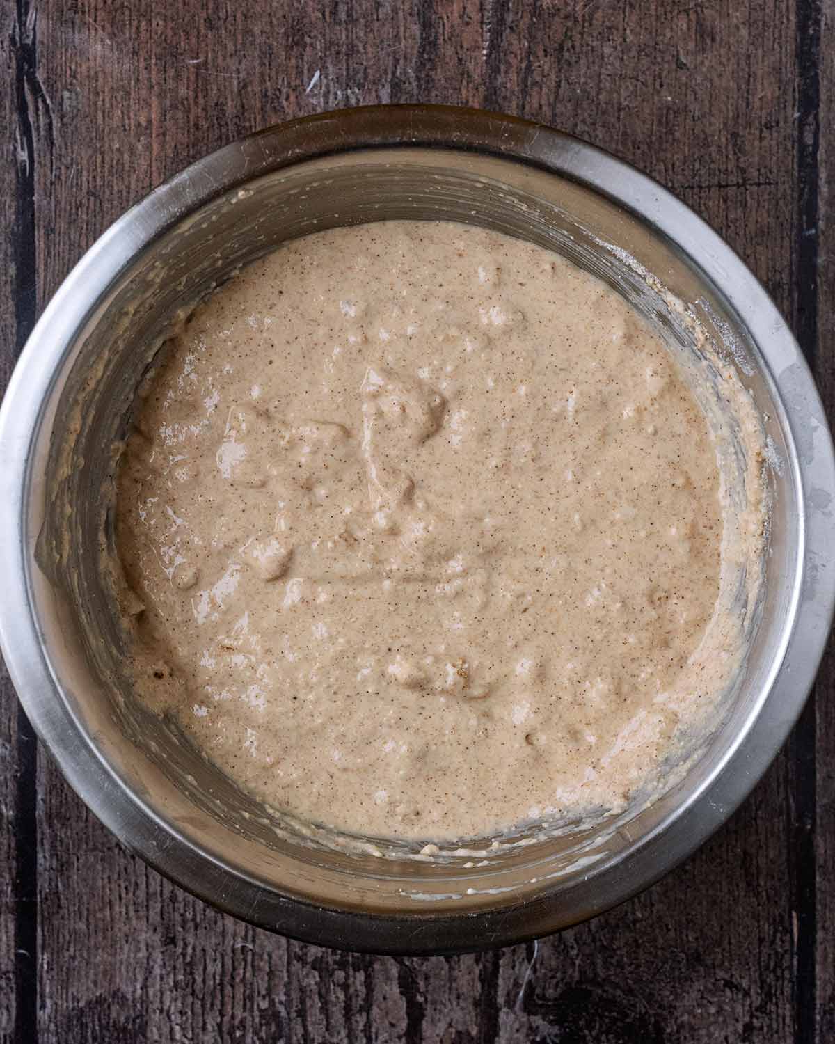 The wet and dry ingredients combined together in one bowl.