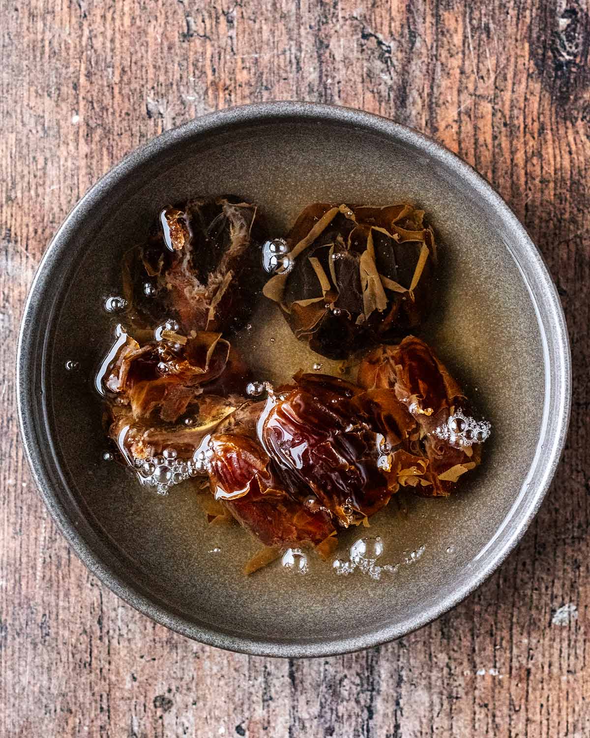 Medjool dates soaking in water.