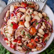 Italian bean salad with a text overlay title.