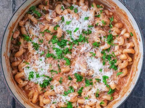 A large cooking pot full of creamy beef pasta.
