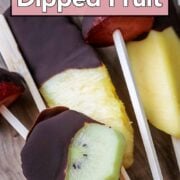 Chocolate dipped fruit with a text overlay title.