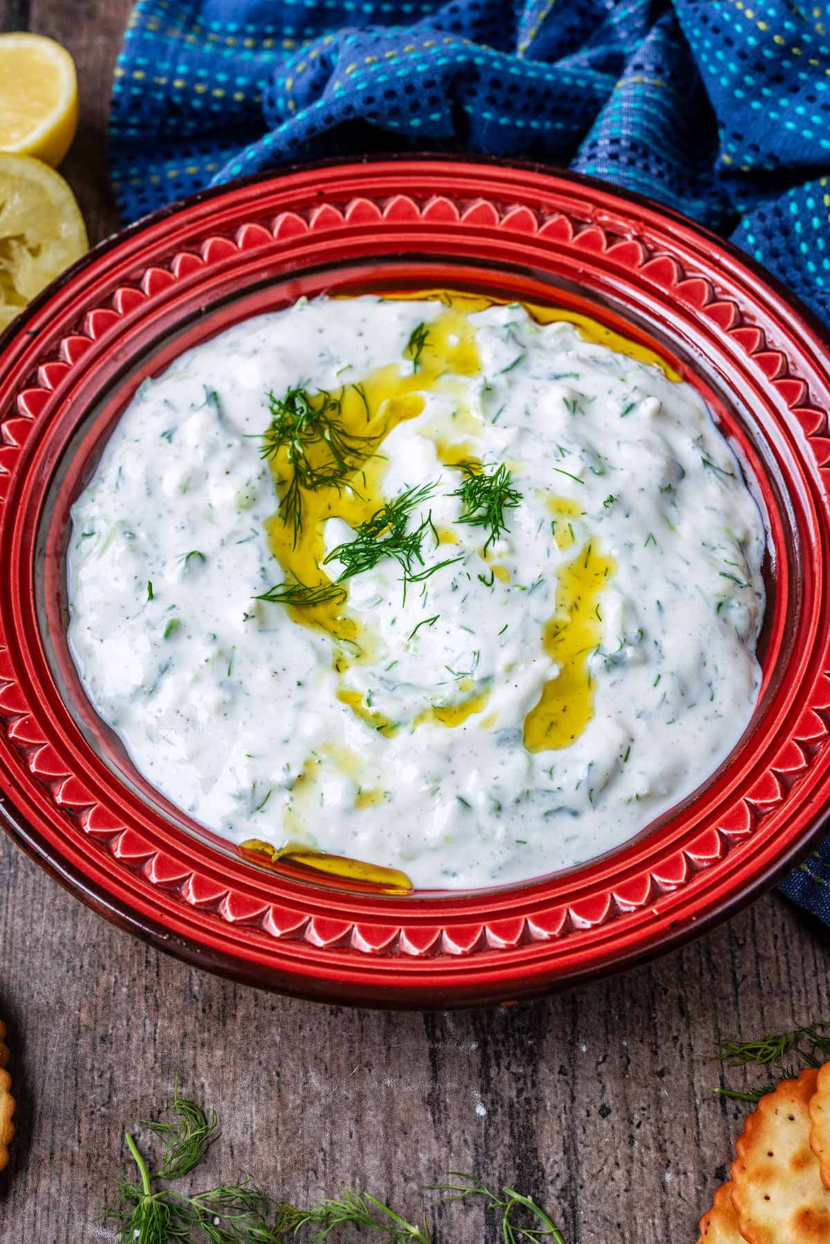 Tzatziki in a red bowl.
