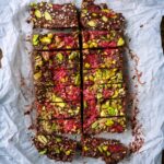 Chocolate Fudge Bars on a sheet of parchment paper.