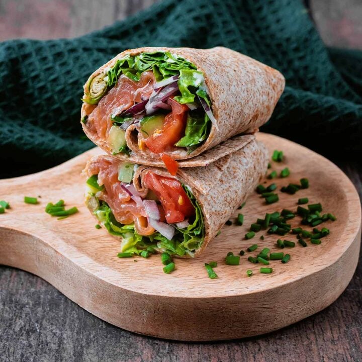 Smoked salmon wraps stacked on top of each other.