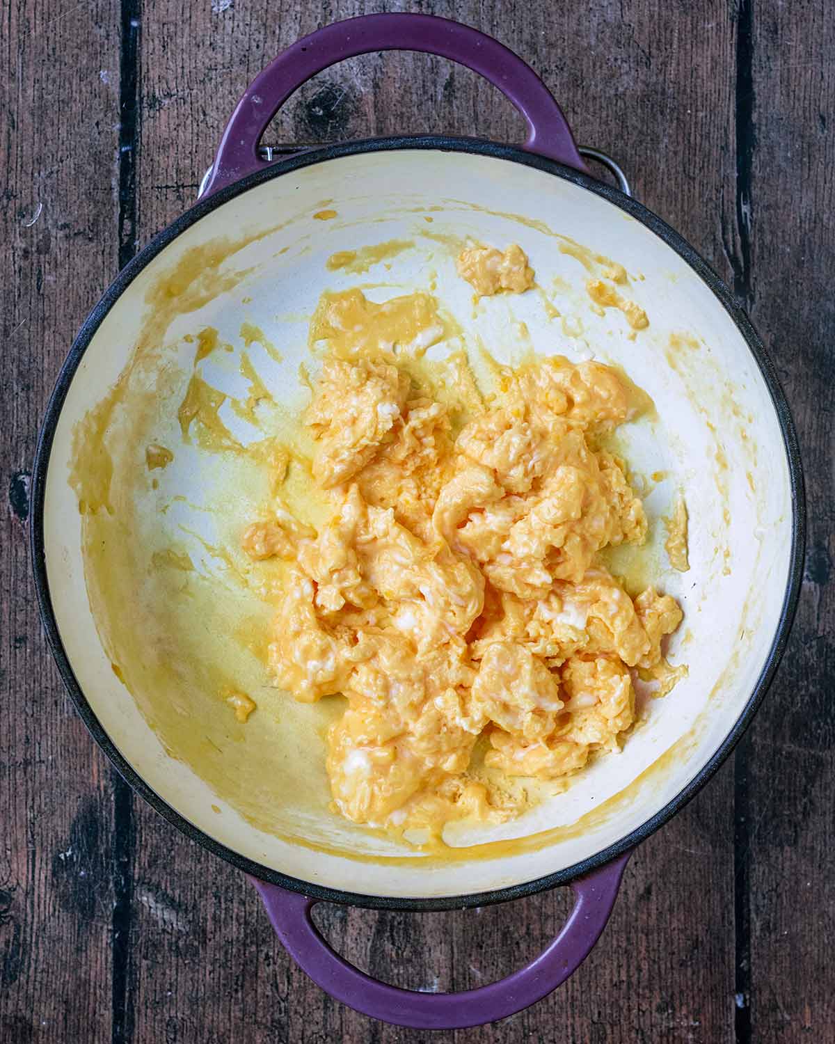 Scrambled eggs in a pan.