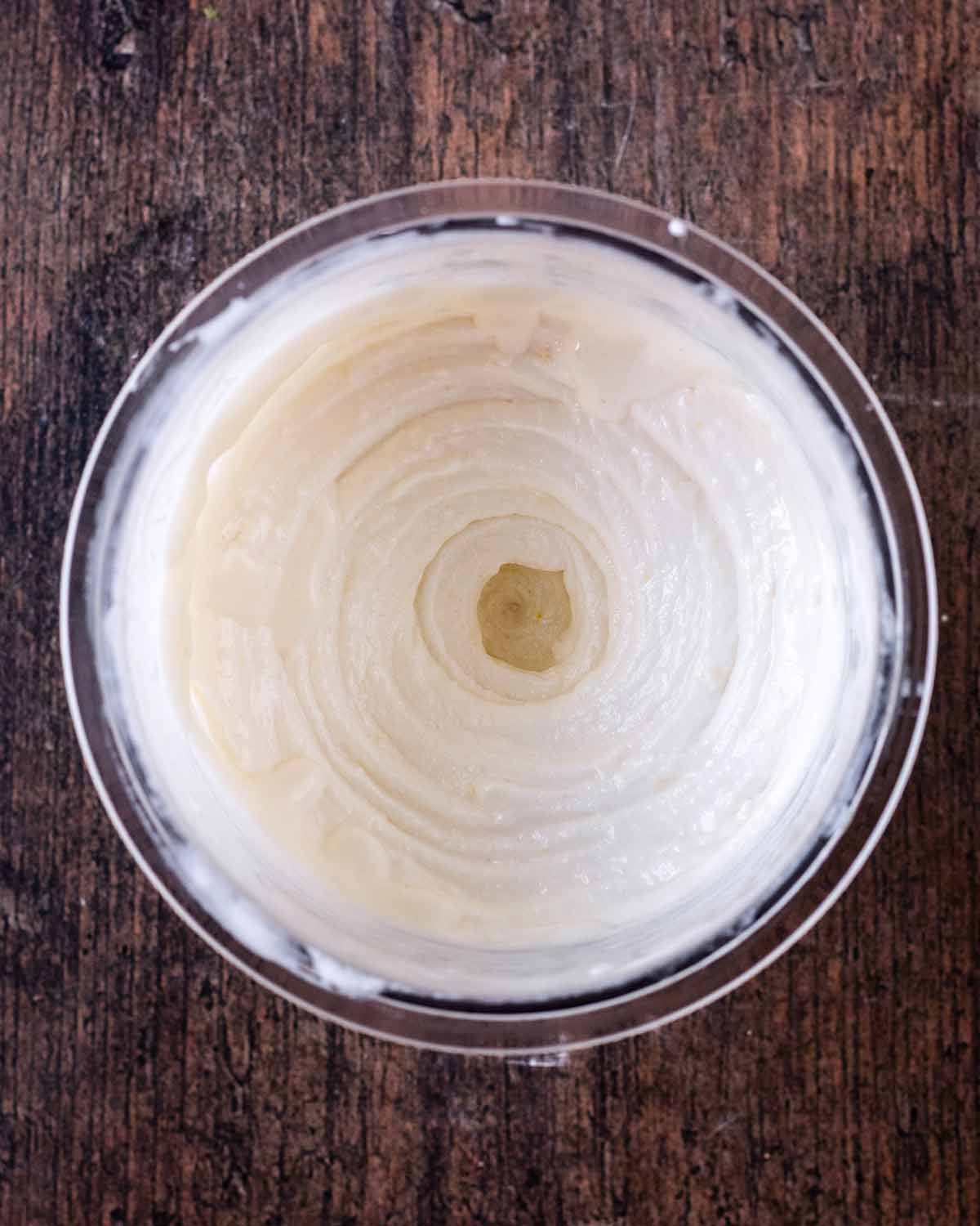 Creamy lemon ice cream in the pint tub.