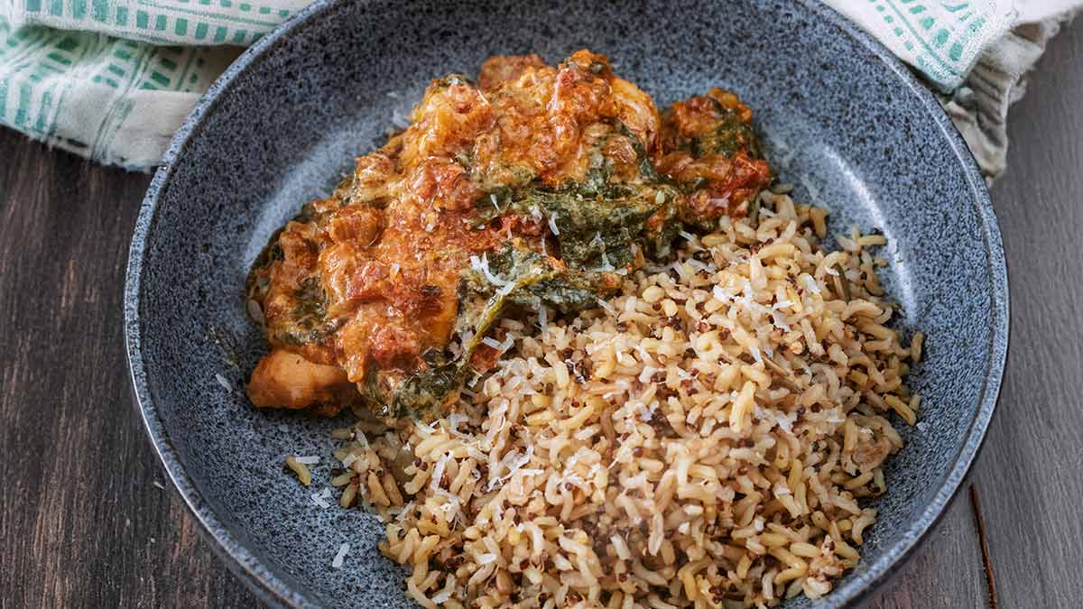 Easy Crockpot Pesto Chicken with Sun-Dried Tomato and Creamy Spinach Sauce