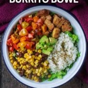Vegan burrito bowl with a text overlay title.