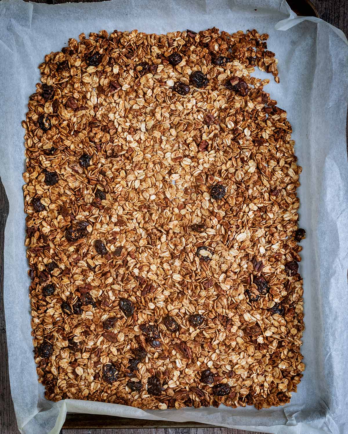 Cooked granola on the baking tray.