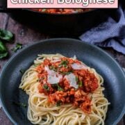 Chicken bolognese with a text overlay title.