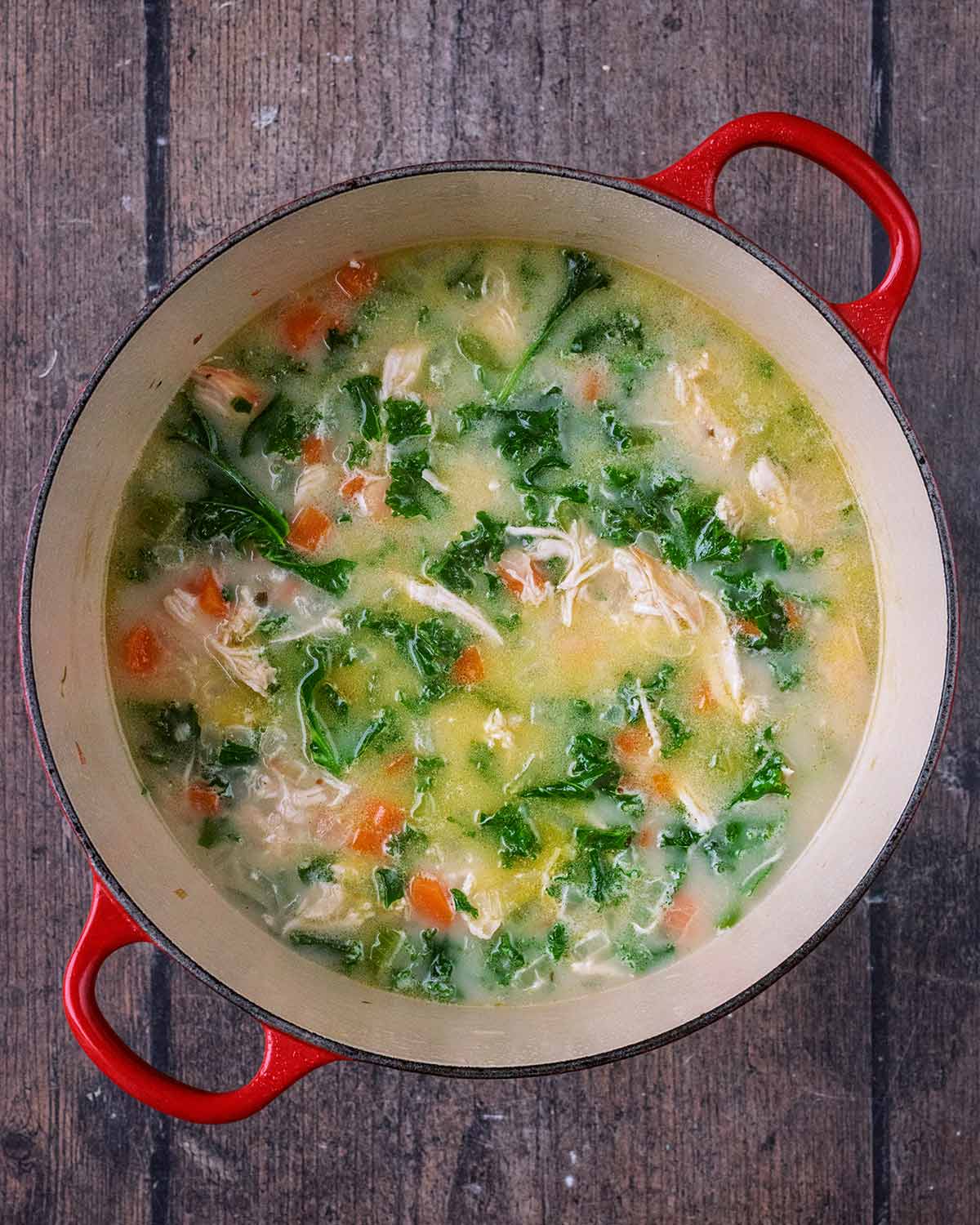 Cooked chicken and bean soup in the pan.