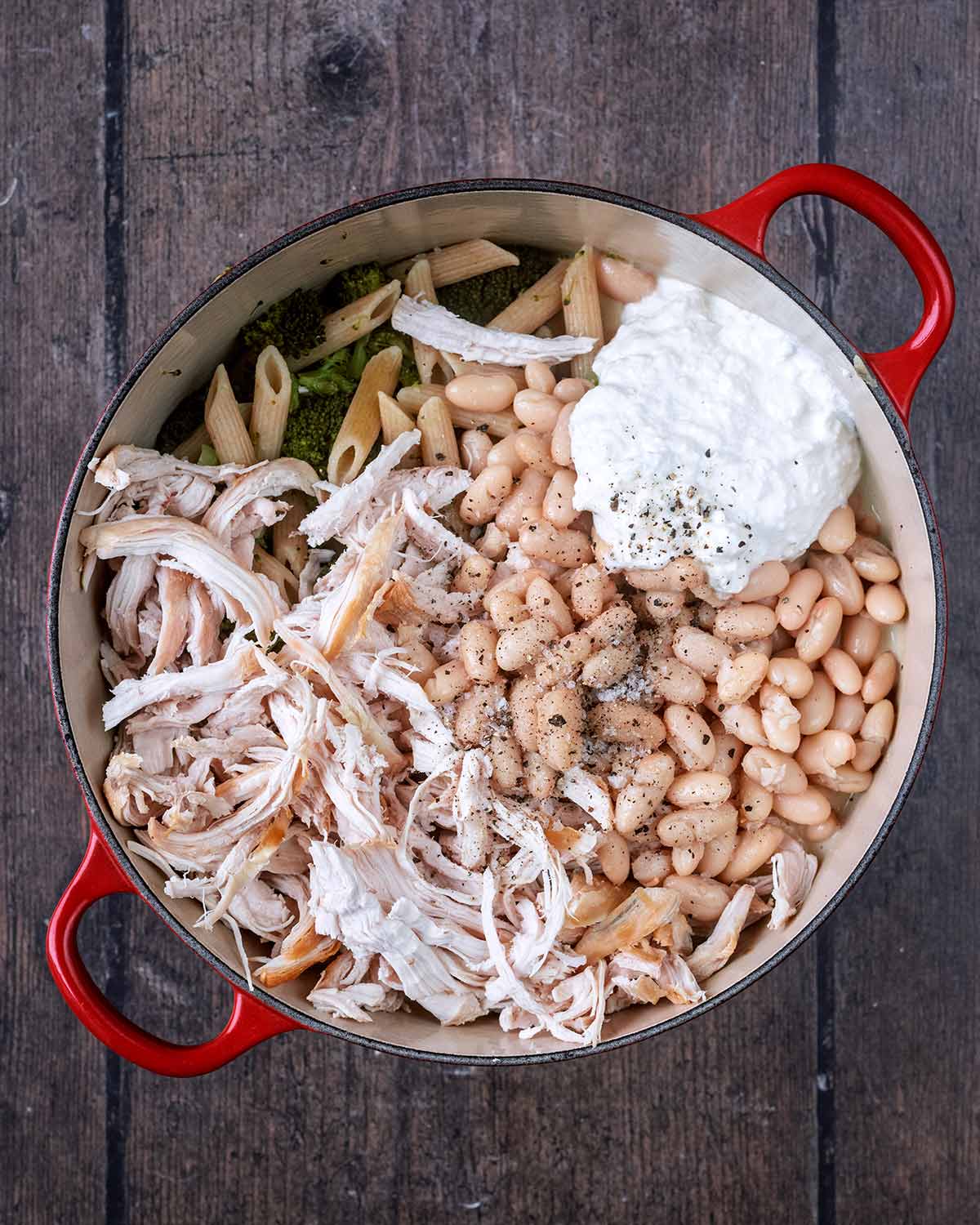 Beans, chicken and cottage cheese added to the pan.