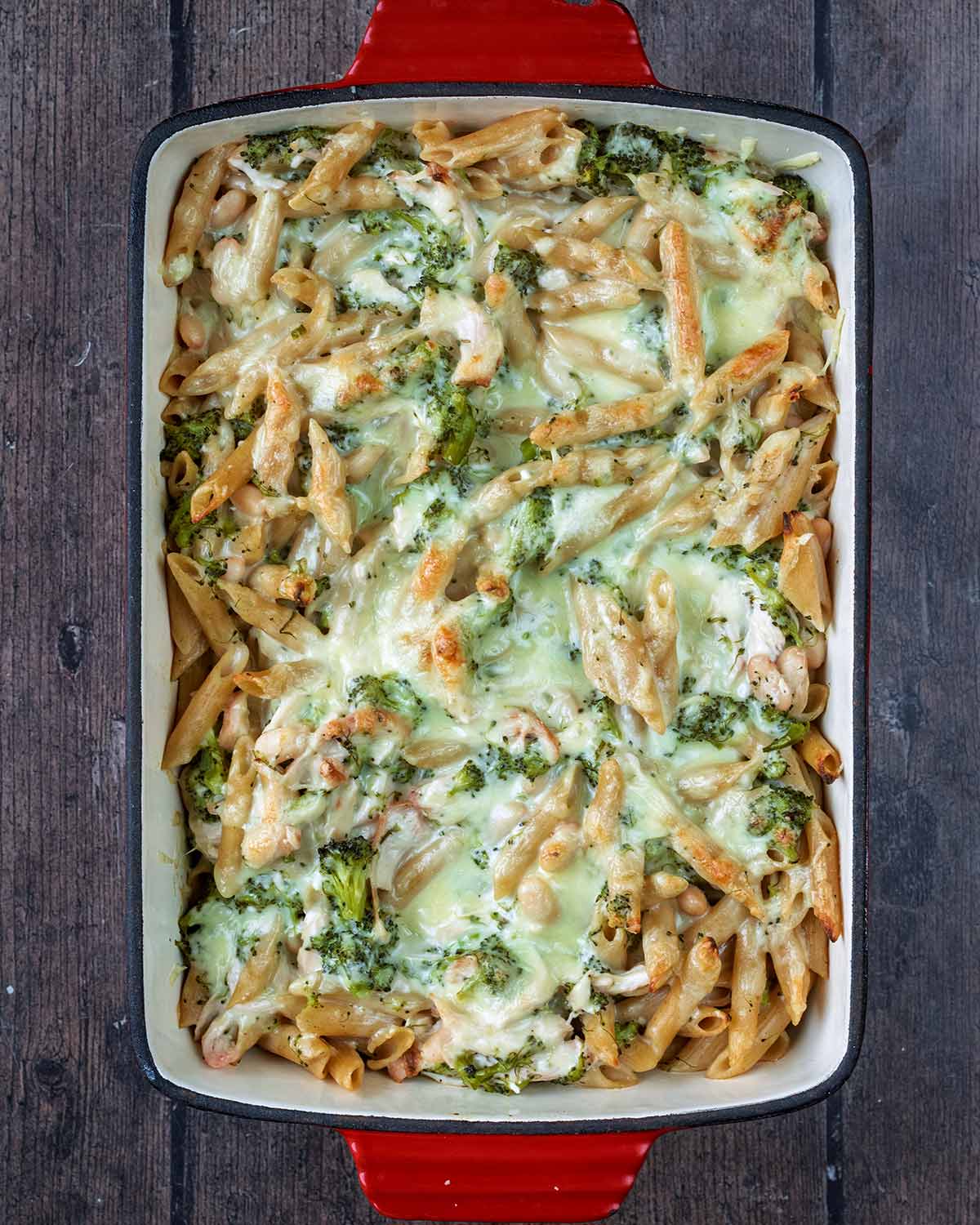 Melted, browned cheese on top of the pasta.