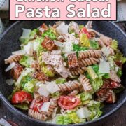 Chicken caesar pasta salad with a text overlay title.