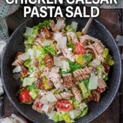 Chicken caesar pasta salad with a text overlay title.