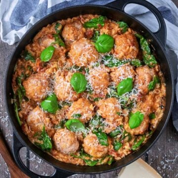 Marry Me Chicken Meatballs in a large black cooking pan.