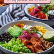 Bean and chicken fajita bowl with a text overlay title.