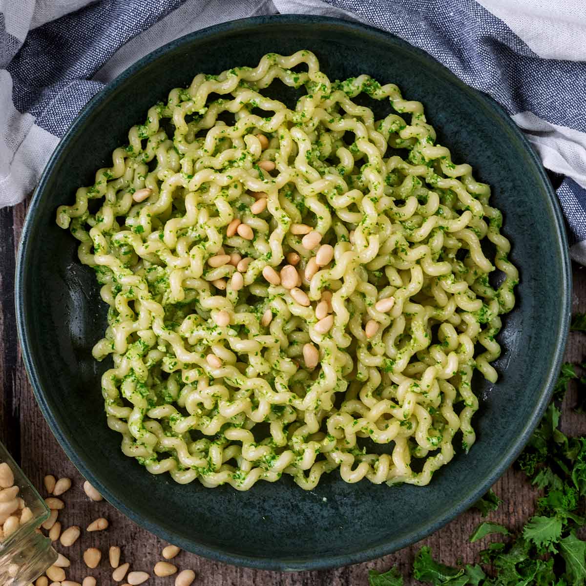 A large bowl of kale pesto pasta.