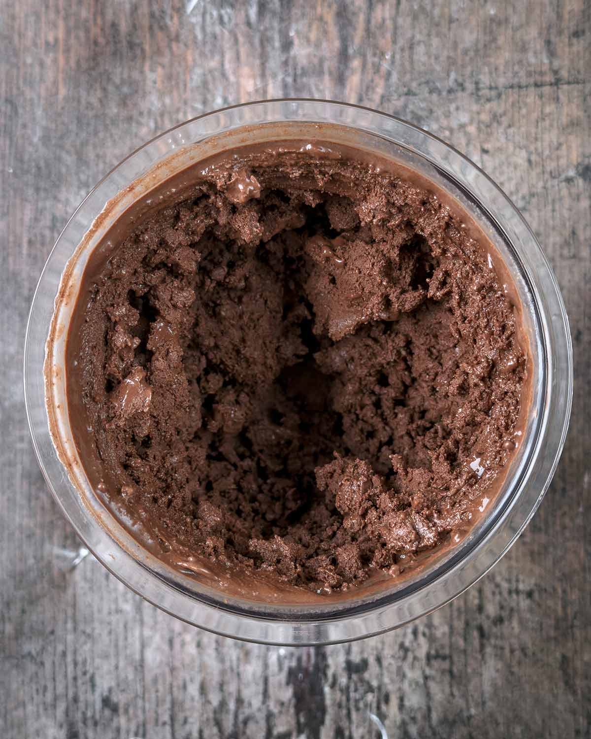The processed chocolate creamy in the tub.
