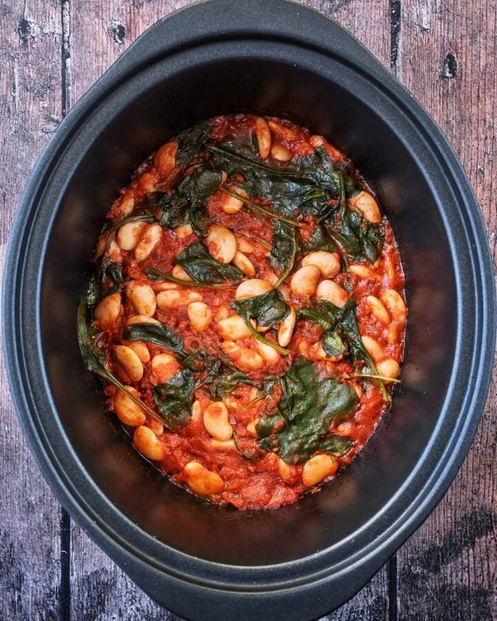The spinach now wilted into the tomato sauce.