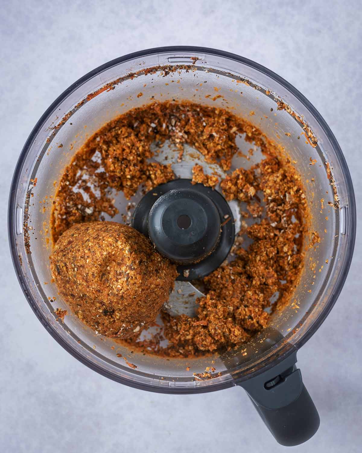 Everything processed together to form a ball in the food processor.