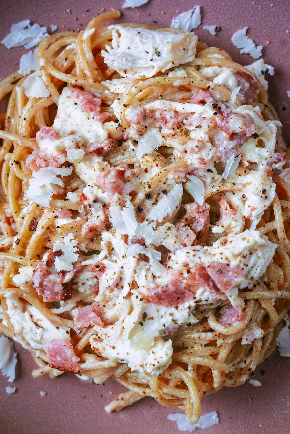 Chopped bacon and shredded chicken mixed into a creamy spaghetti.
