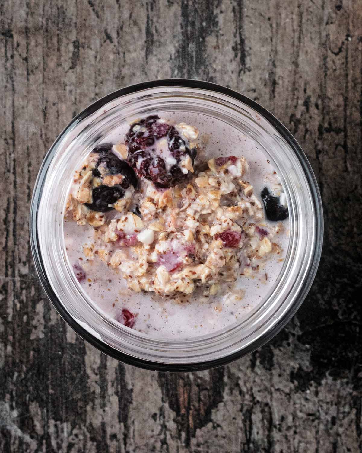 THe overnight oat mixture in a small glass jar.