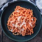 Spiral pasta coated in cottage cheese pasta sauce.