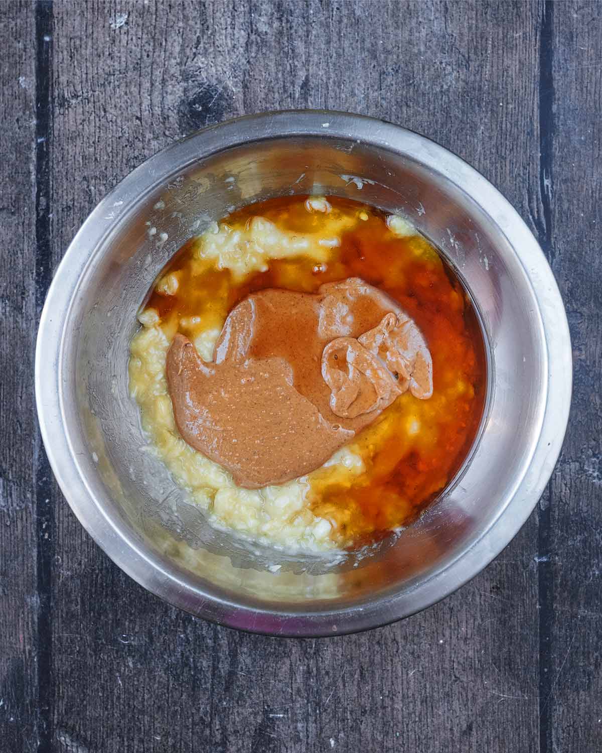 Peanut butter, maple syrup and vanilla added to the banana.