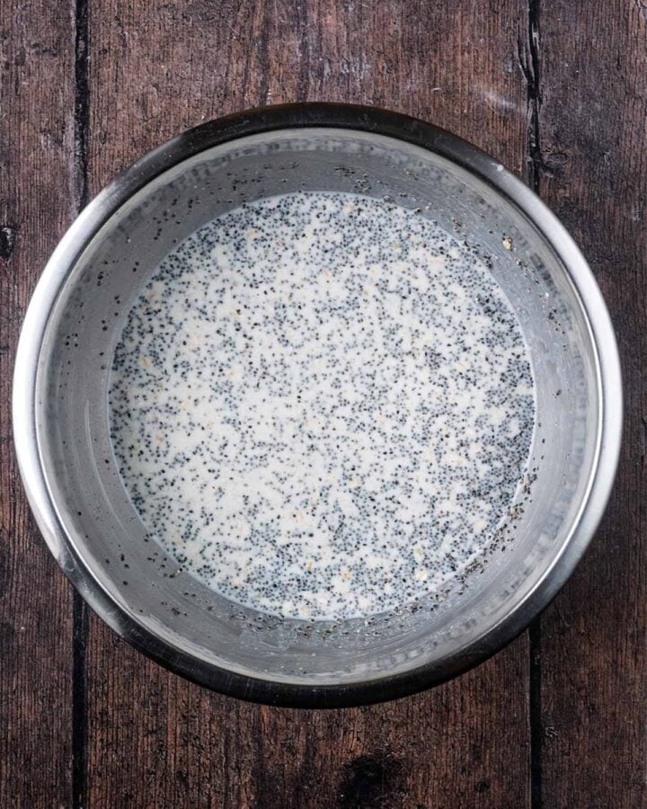 Milk and yogurt added to the bowl and everything mixed together.