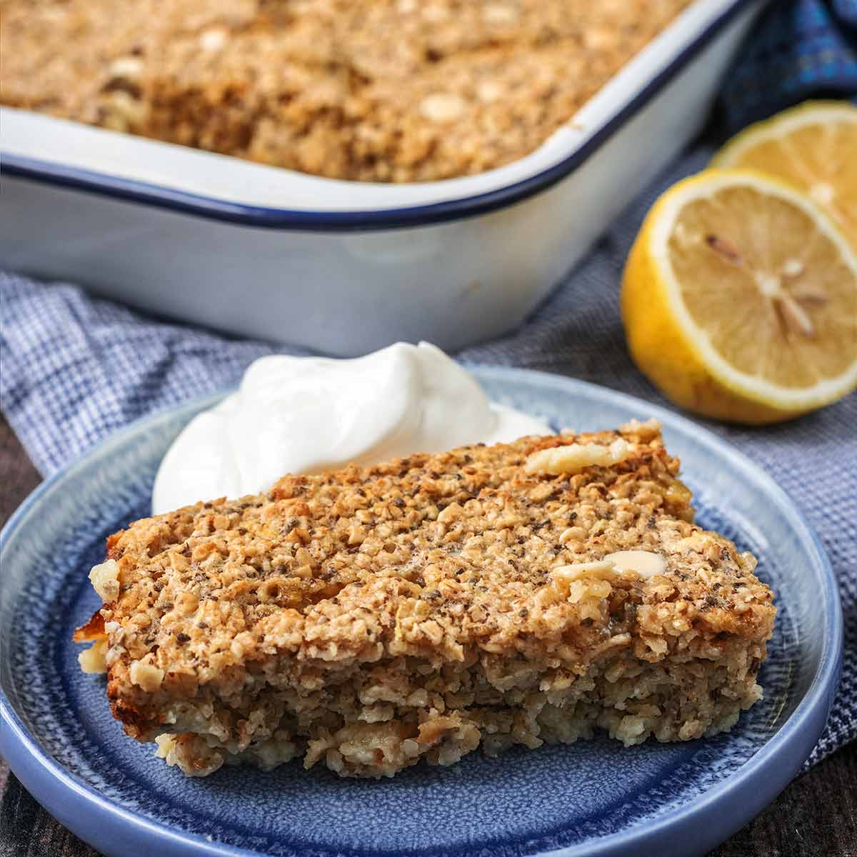 A portion of lemon baked oats on a blue plate.
