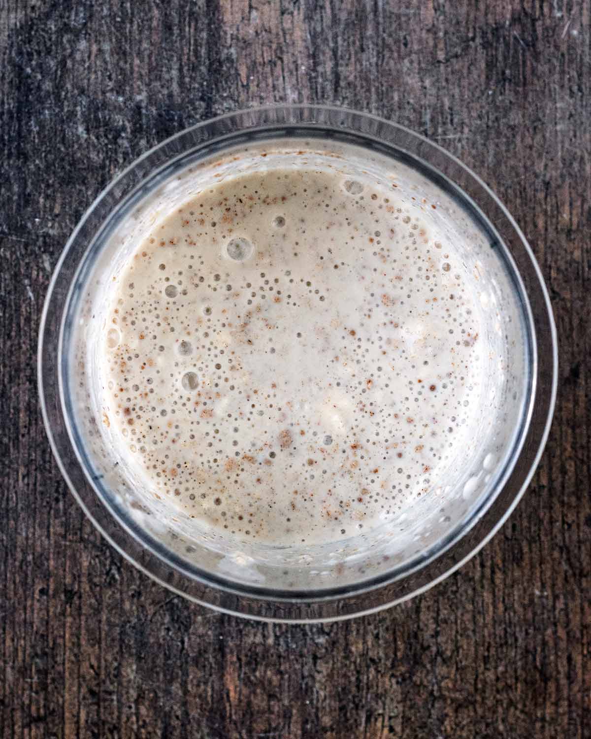 Milk, yogurt and spices in a Ninja pint container.