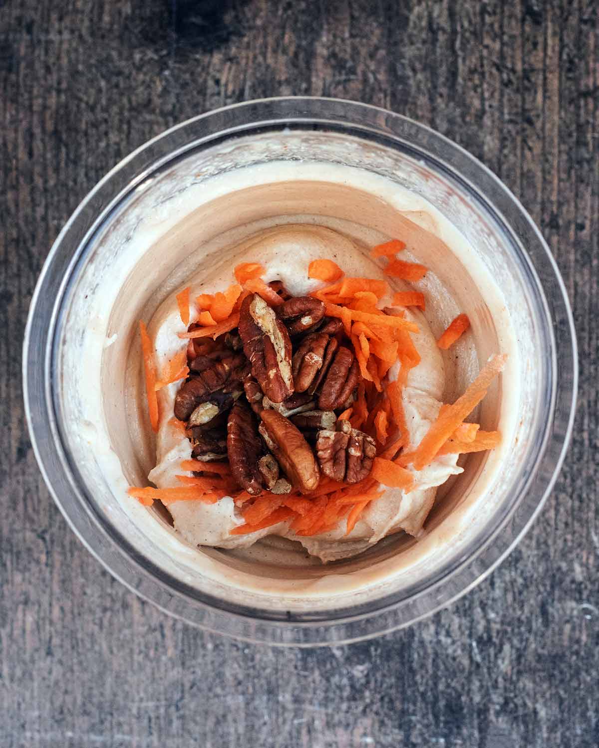 Grated carrot and pecans added to the processed ice cream.