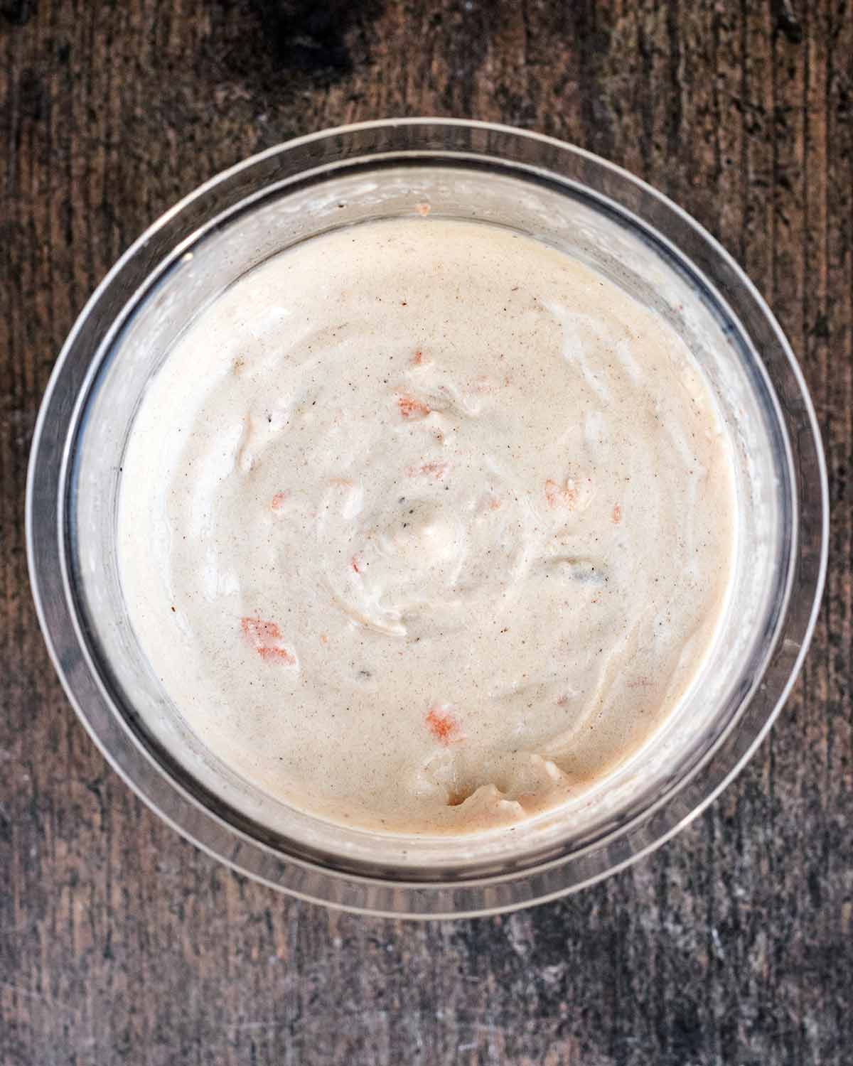 The ice cream processed again with the carrot and nuts mixed in.