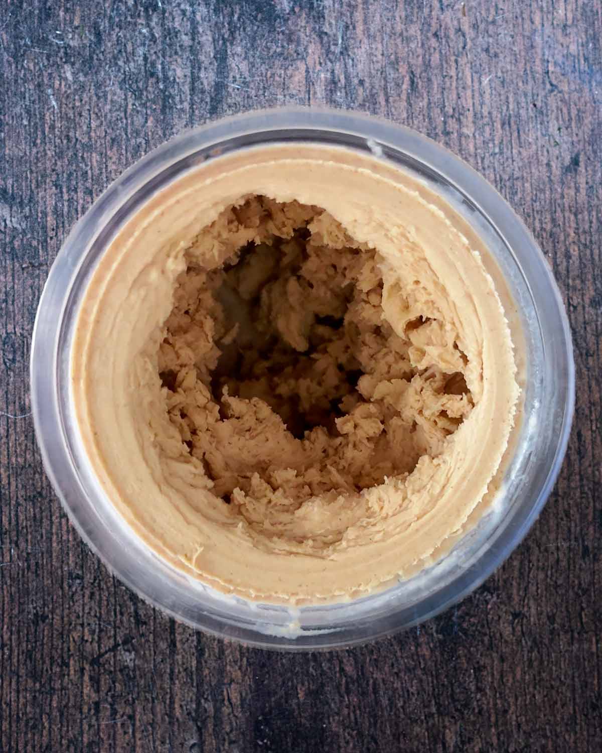 The frozen tub processed into a creamy consistency.