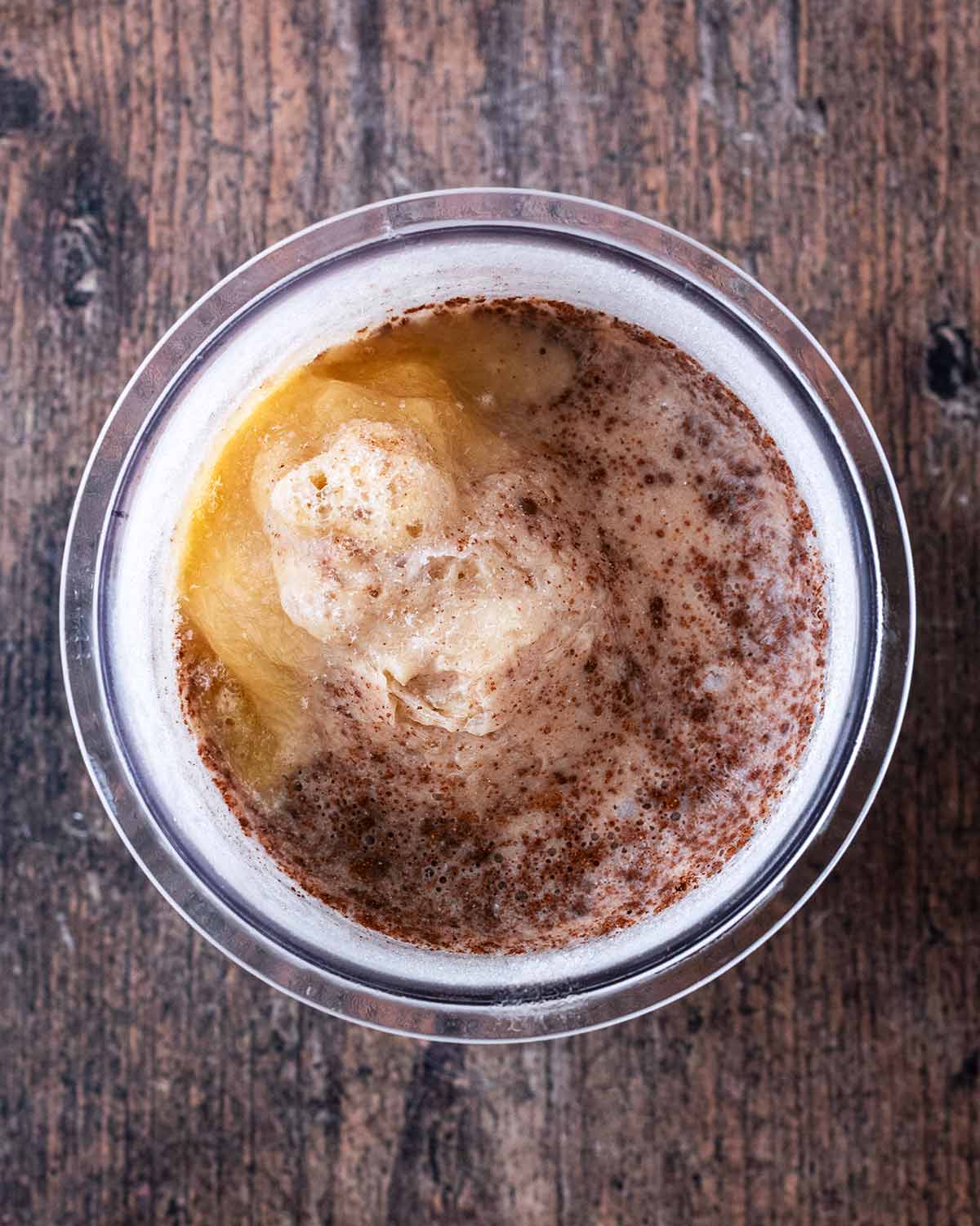 The frozen mixture in the pint tub.