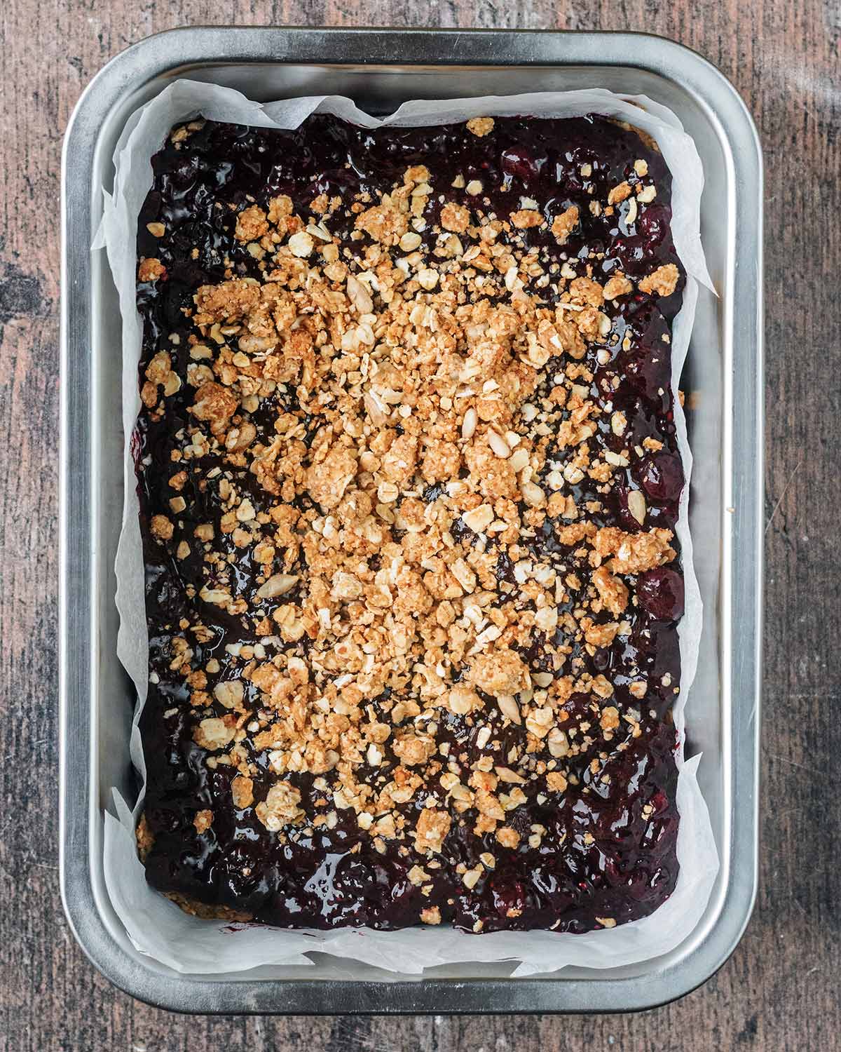 The remaining oat mixture crumbled on top of the jam.