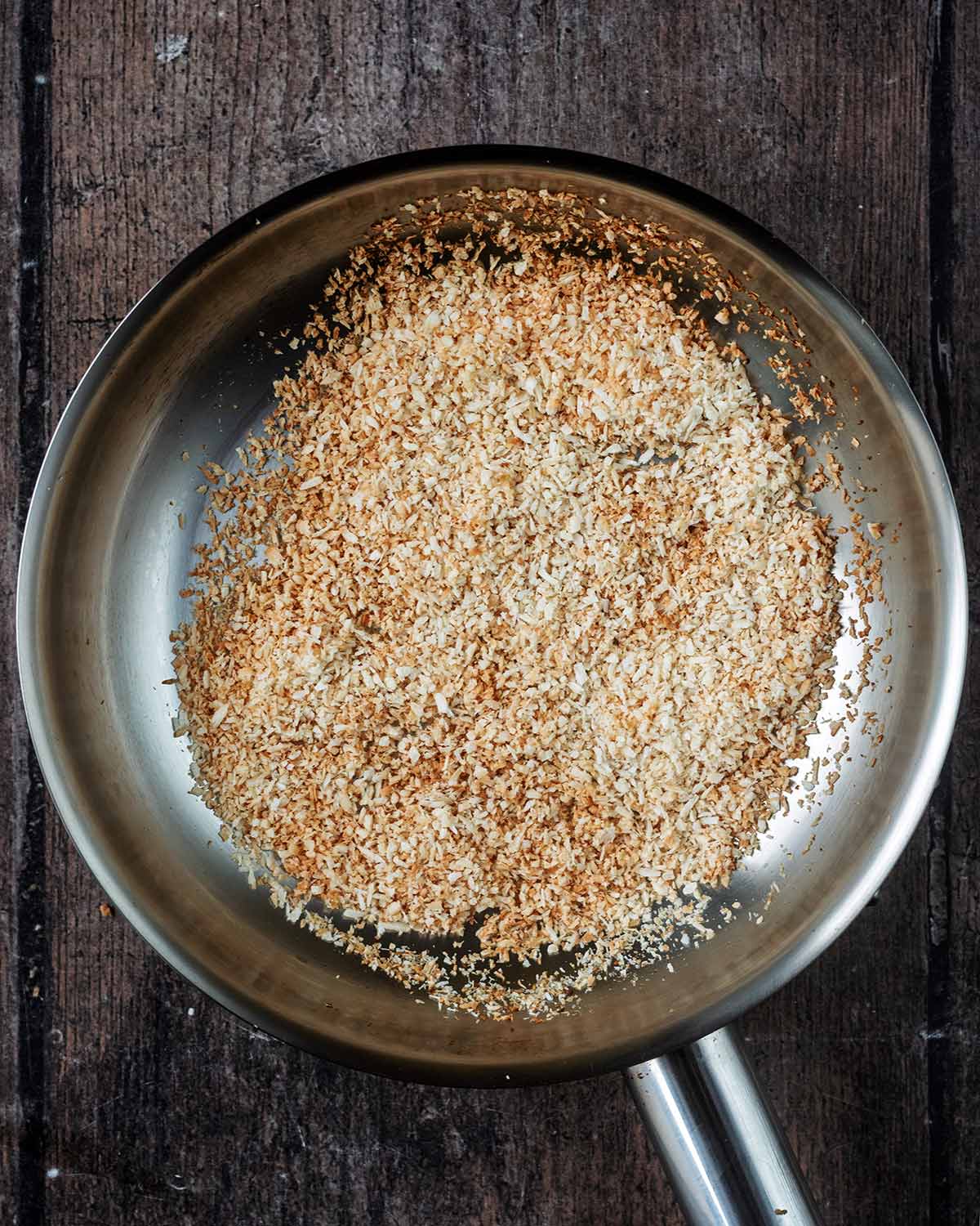 Toasted coconut in the pan.
