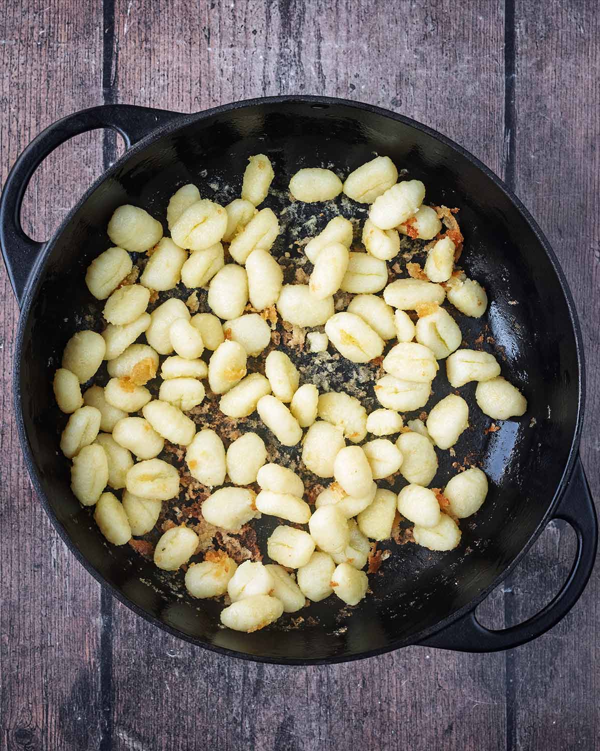 Cooked gnocchi in the pan.